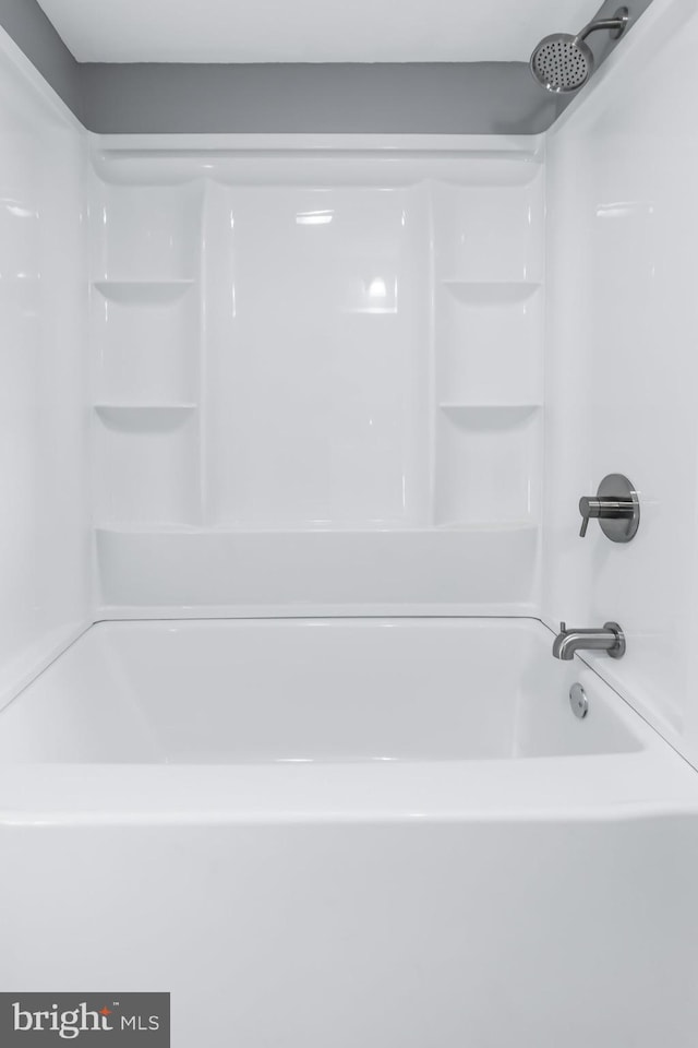 bathroom featuring bathing tub / shower combination