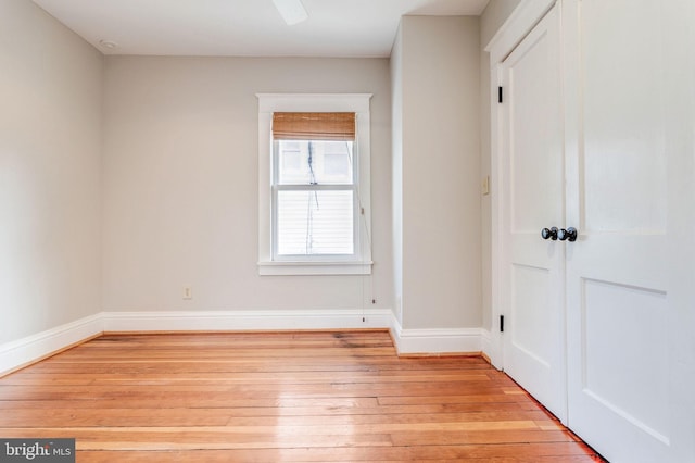 spare room featuring light hardwood / wood-style flooring