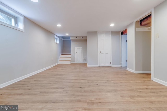 basement featuring light hardwood / wood-style floors