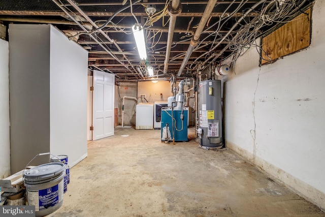 basement with washing machine and dryer and gas water heater