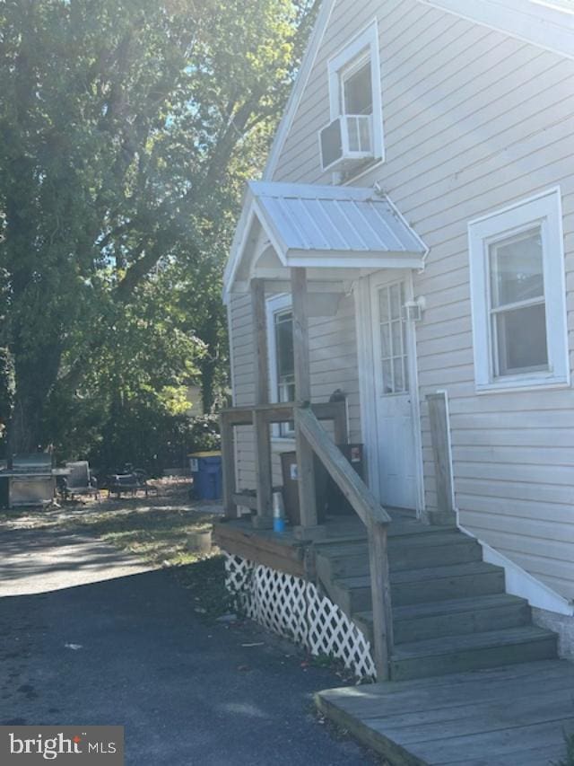 property entrance with cooling unit