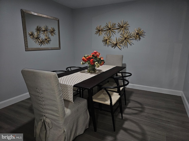 dining room featuring dark hardwood / wood-style flooring