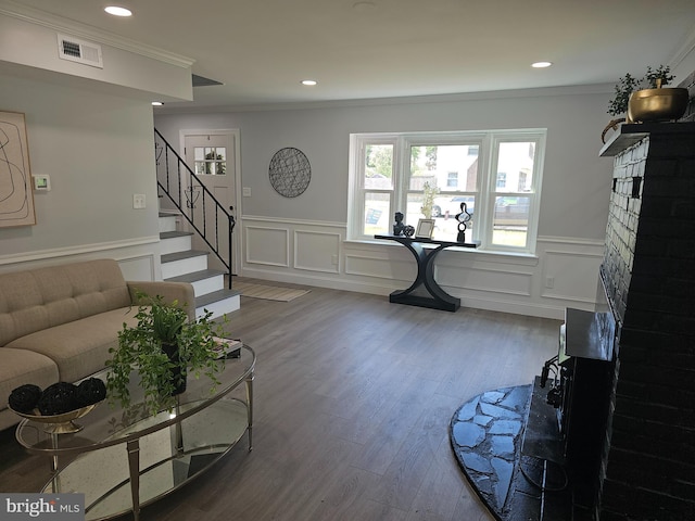 54 Shelbourne Ln, Willingboro, NJ 08046 - living area with ornamental molding, wainscoting, wood finished floors, recessed lighting, and stairway