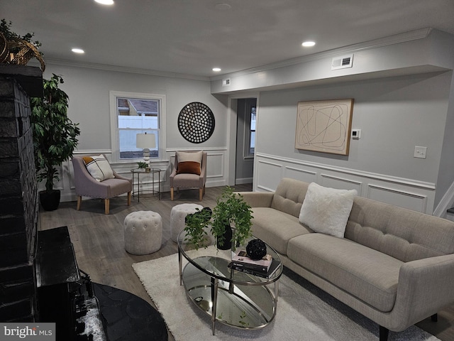 54 Shelbourne Ln, Willingboro, NJ 08046 - living room with ornamental molding, wood finished floors, recessed lighting, a wainscoted wall, and a decorative wall