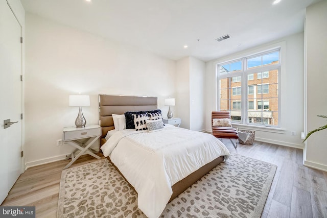 bedroom featuring light wood-type flooring