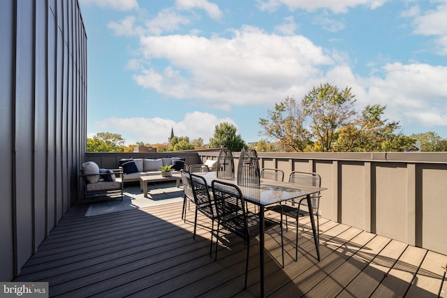 deck featuring outdoor lounge area