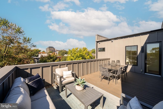 wooden deck with an outdoor hangout area