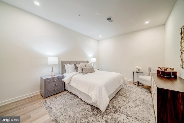 bedroom with light hardwood / wood-style flooring