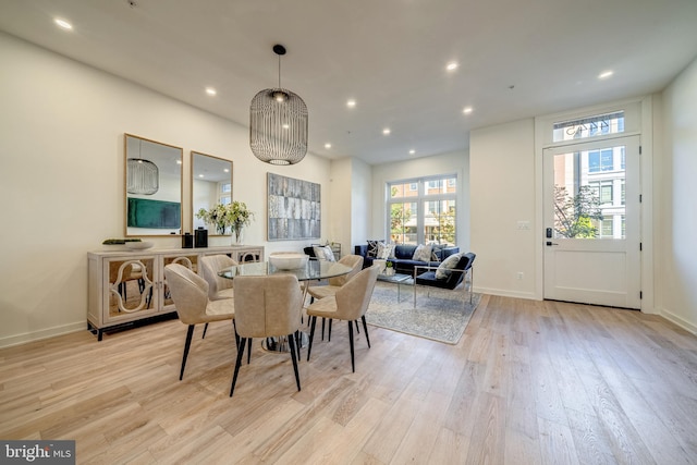 dining space featuring light hardwood / wood-style floors