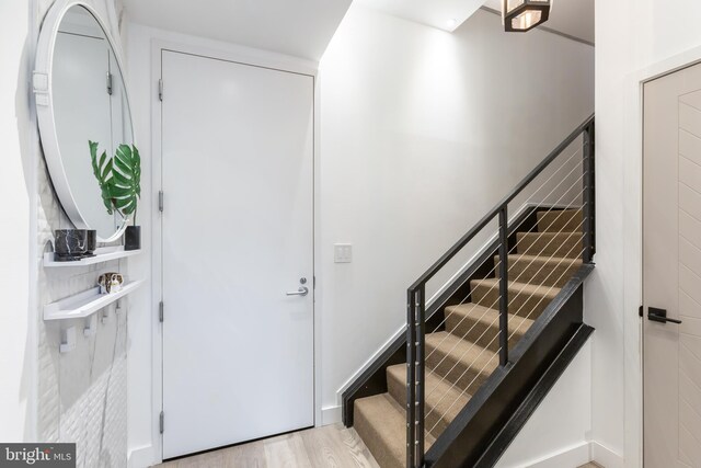 foyer entrance featuring light hardwood / wood-style flooring