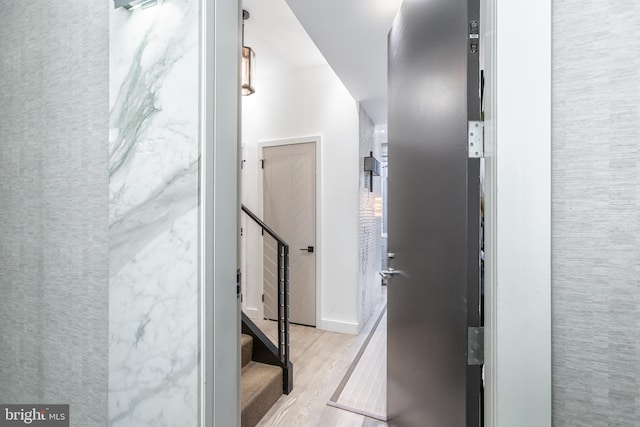 hall featuring light hardwood / wood-style flooring