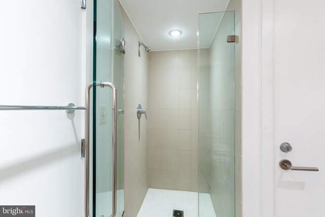 bathroom with an enclosed shower