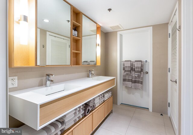 bathroom featuring vanity and tile patterned floors