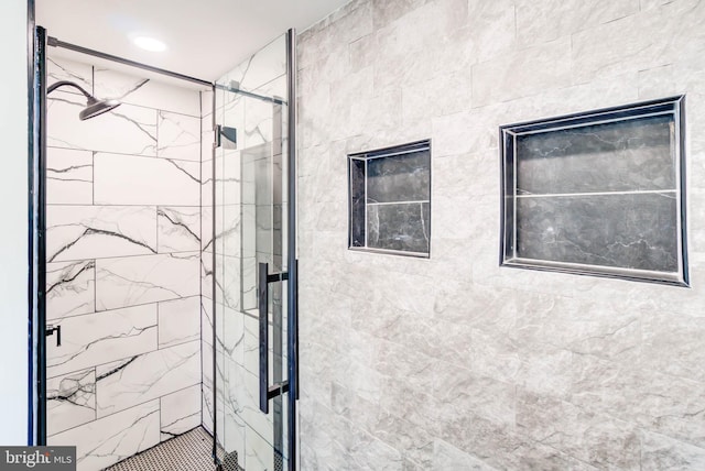 bathroom with an enclosed shower