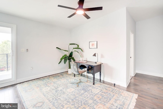 office area with ceiling fan, wood finished floors, and baseboards