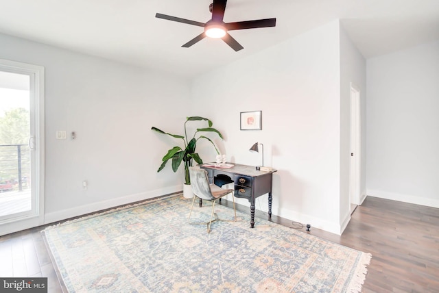 home office featuring hardwood / wood-style flooring, a healthy amount of sunlight, and ceiling fan