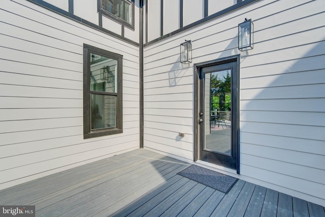 entrance to property featuring a deck