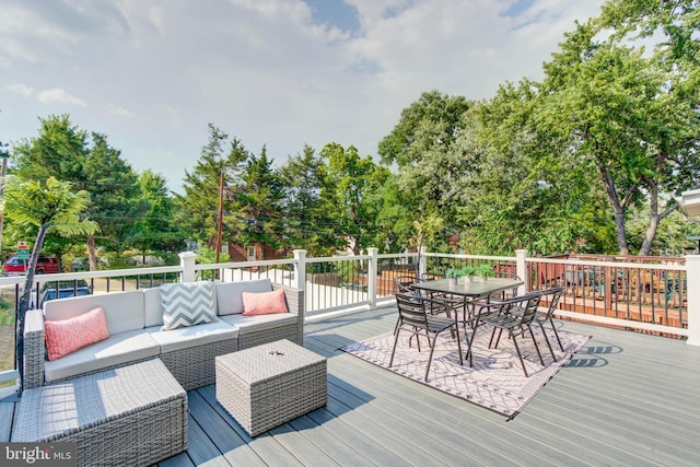 deck with outdoor lounge area and outdoor dining area