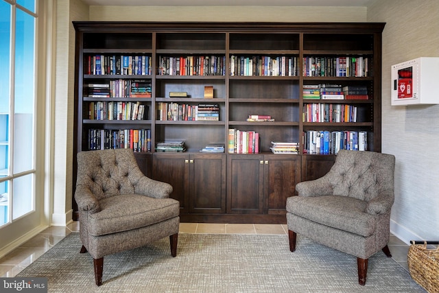 sitting room featuring light tile patterned flooring