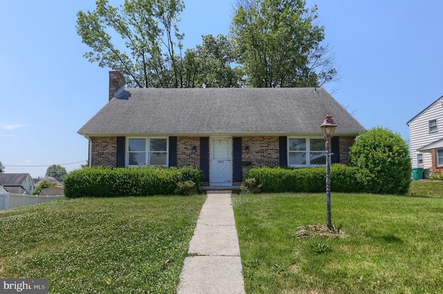 view of front of home with a front yard