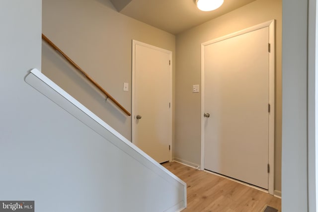 foyer with light wood-type flooring