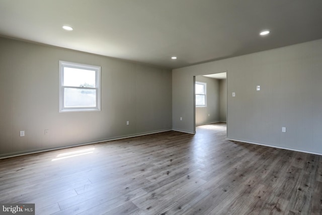 spare room featuring light wood-type flooring