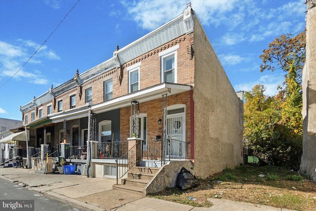 multi unit property featuring covered porch