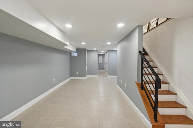 basement with light tile patterned floors