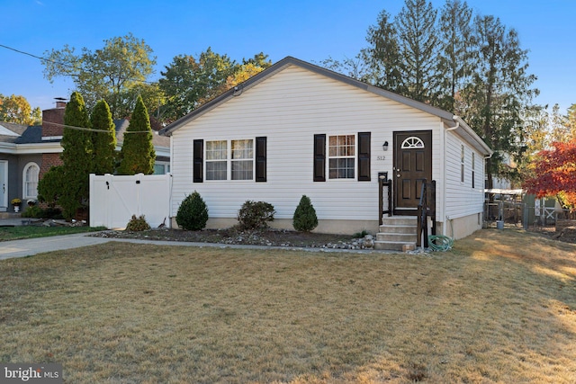 view of front of home with a front yard