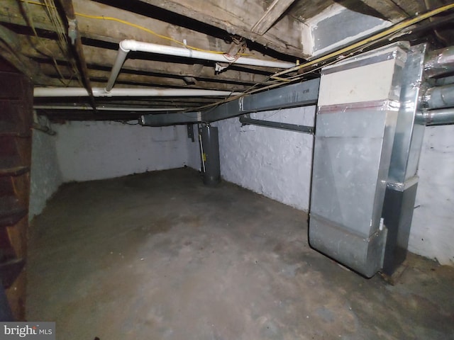 basement featuring heating unit