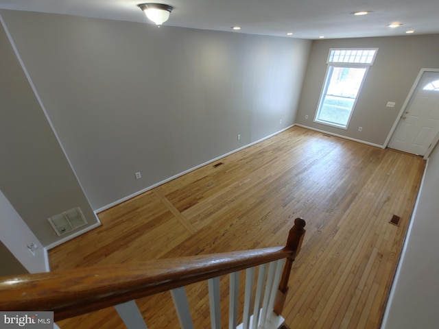 foyer entrance with light hardwood / wood-style flooring