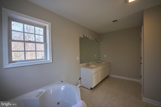 bathroom featuring a bathing tub and vanity