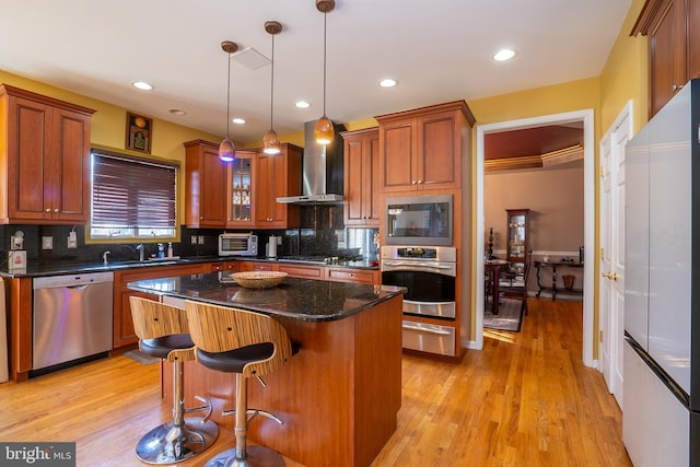 10 Eddie Ct, Dayton, NJ 08810 - kitchen featuring decorative backsplash, a warming drawer, stainless steel appliances, wall chimney exhaust hood, and a kitchen island