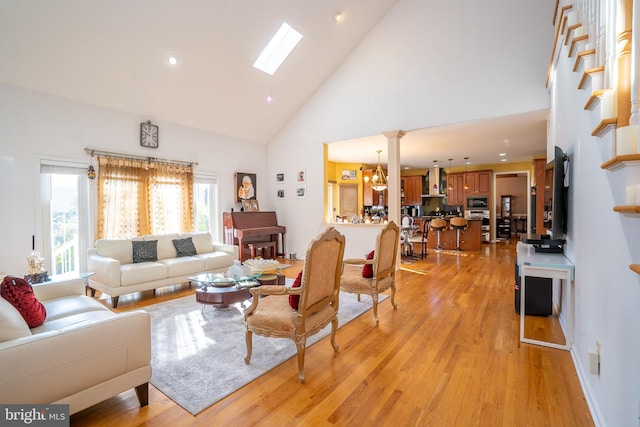10 Eddie Ct, Dayton, NJ 08810 - living room featuring high vaulted ceiling, light wood-style floors, and recessed lighting