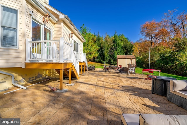 10 Eddie Ct, Dayton, NJ 08810 - view of home's exterior featuring driveway, an outbuilding, a shed, and a garage