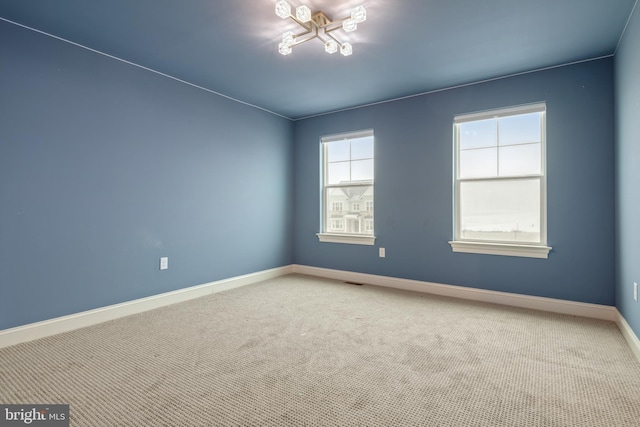 view of carpeted spare room