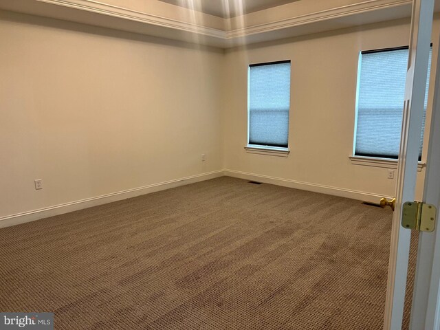 106 Berkshire Dr, Carlisle, PA 17015 - empty room with dark colored carpet, baseboards, and healthy amount of natural light