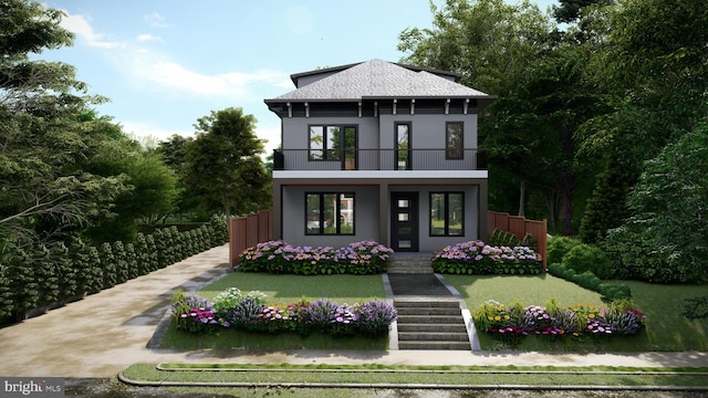 view of front of home with a balcony