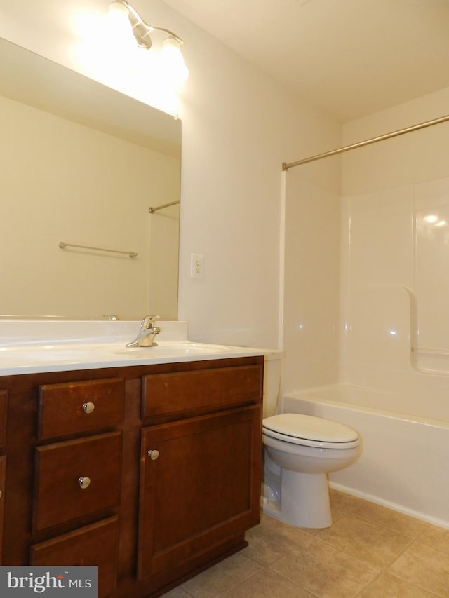 full bathroom featuring tile patterned flooring, vanity, toilet, and bathtub / shower combination