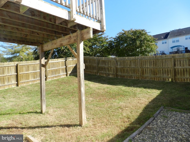 view of yard with a wooden deck