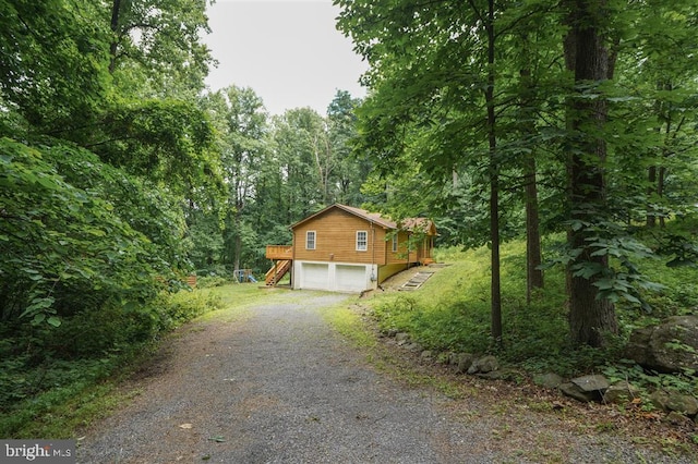 view of home's exterior with a garage