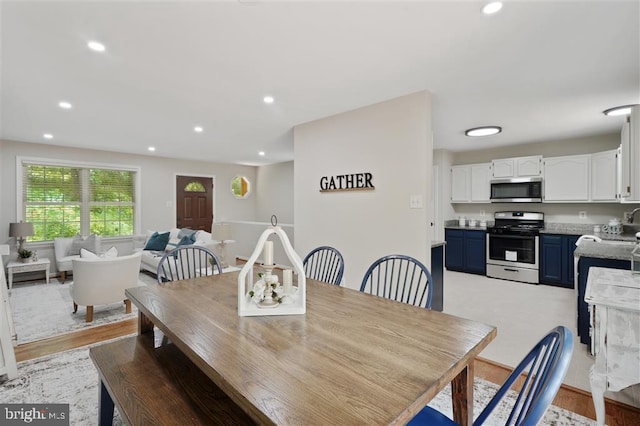 dining room featuring light wood-type flooring