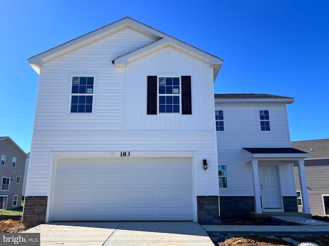 view of front of property featuring a garage