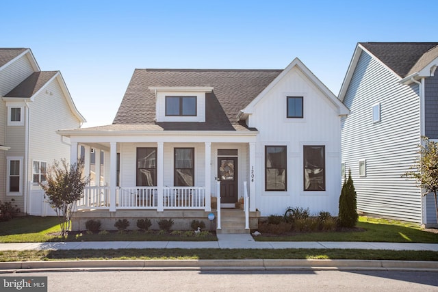 modern inspired farmhouse featuring a porch