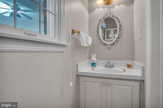 bathroom featuring vanity and ceiling fan