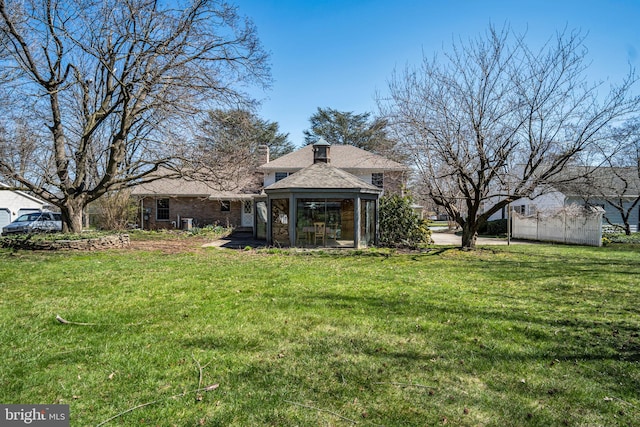 view of front of home featuring a front lawn