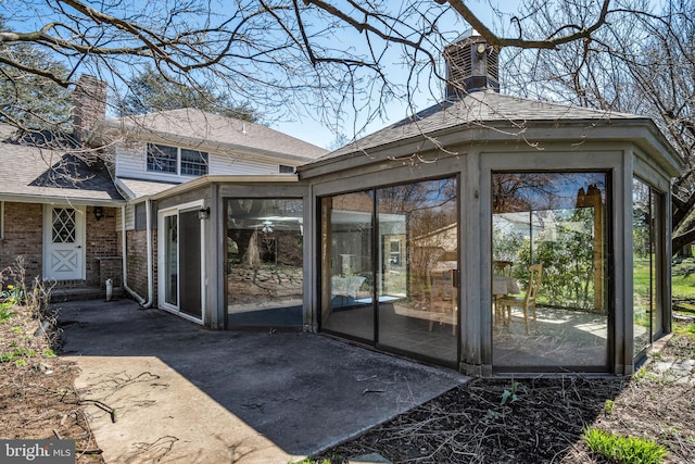 exterior space featuring central air condition unit