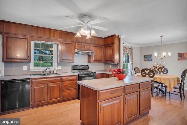 kitchen with light hardwood / wood-style floors, black appliances, sink, and backsplash