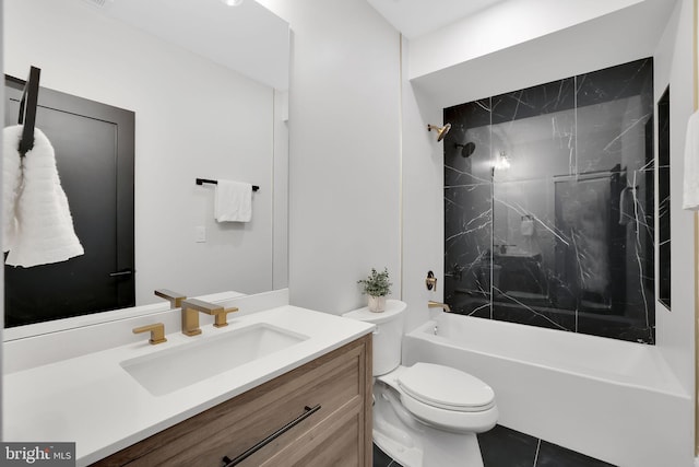 bathroom featuring toilet, tile patterned flooring, vanity, and shower / bathtub combination
