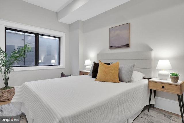 bedroom featuring wood finished floors